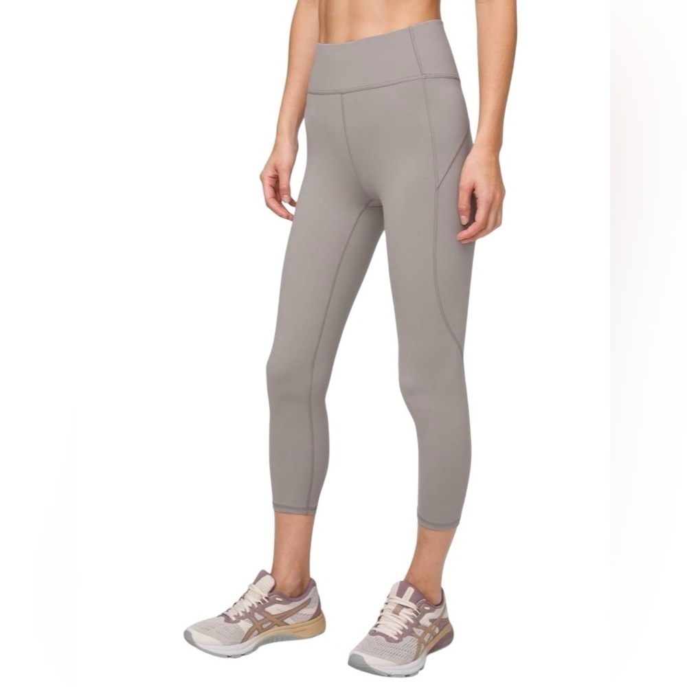 Lululemon - In Movement Crop Leggings 23"
Dark Chrome Sz 8